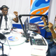 Faima Ibrahim, right, and Justus Ochieng, foreign students at Cavendish and Kampala International University, host a Kiswahili radio presentation at MCI Radio studio in Kampala, Uganda